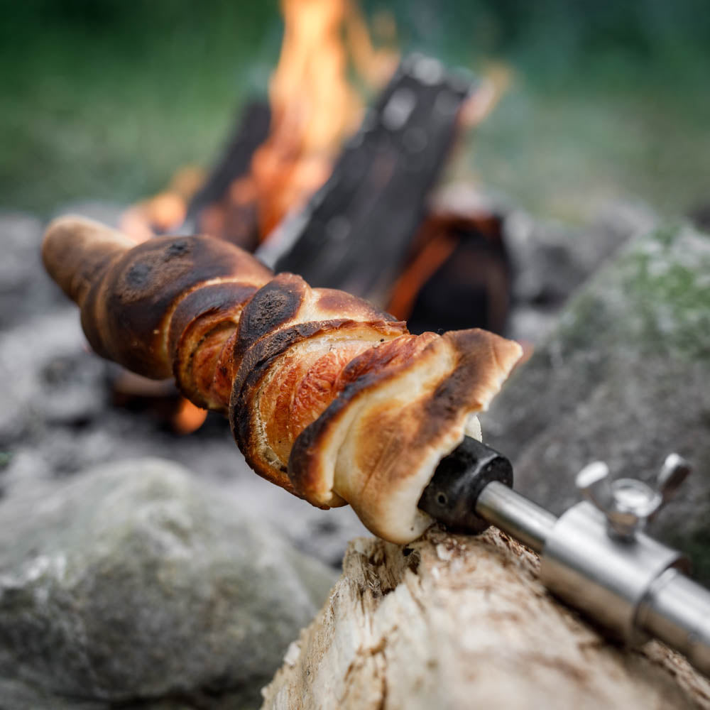 Image of Sweet stick bread dough with the stick bread spit